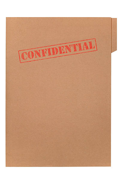 istock Confidential stamped in red on a brown card folder 104772256