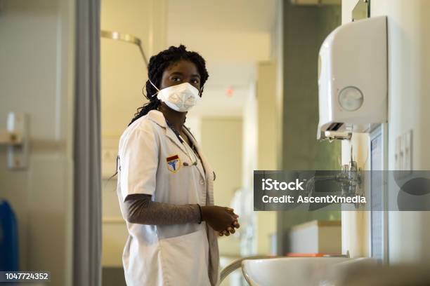 Front Line Healthcare Worker Wearing A Protective Tb Mask Stock Photo - Download Image Now