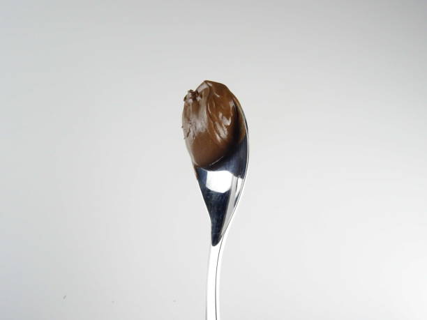 istock Chocolate and hazelnut fudge on a spoon 1047727998