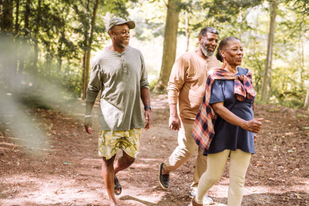 istock best friends walking in the park 1047728656