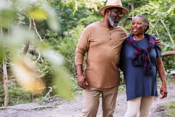 istock Smiling seniors couple on the walk 1047728674