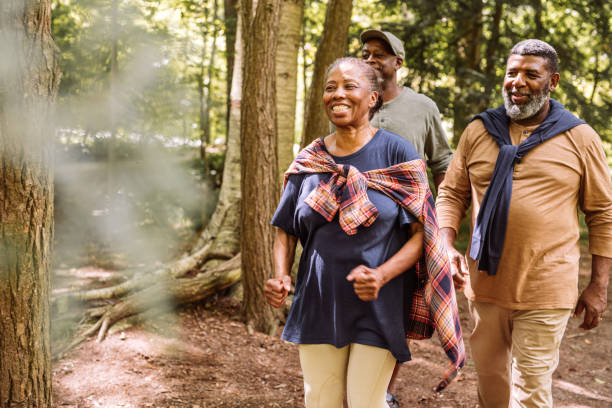 istock best friends walking in the park 1047728970