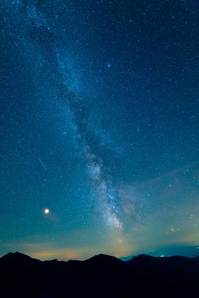 istock The starry sky on the background of mountains 1047734242