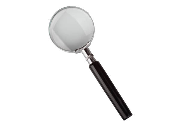 istock Magnifying glass isolated on white background 1047741112