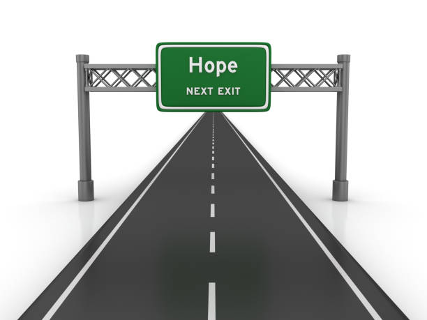 istock Road with Hope Highway Sign - 3D Rendering 1047743674