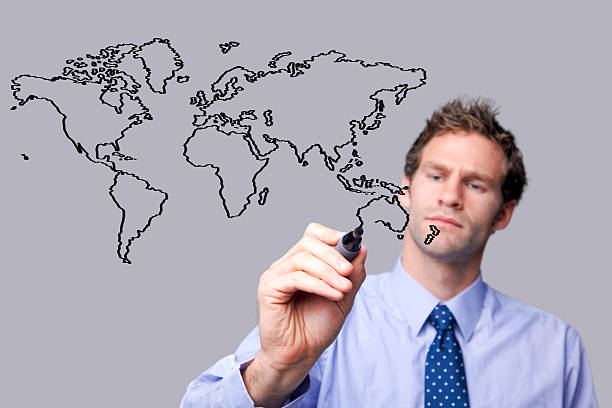 istock Businessman drawing the world map on a glass screen. 104774566