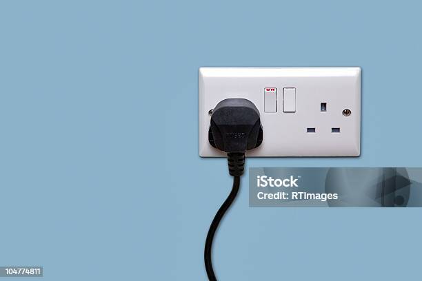 Double Power Socket And Single Plug Switched On Stock Photo - Download Image Now - Electric Plug, Electrical Outlet, UK