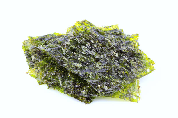 istock Crispy dried seaweed nori isolated. 1047749434