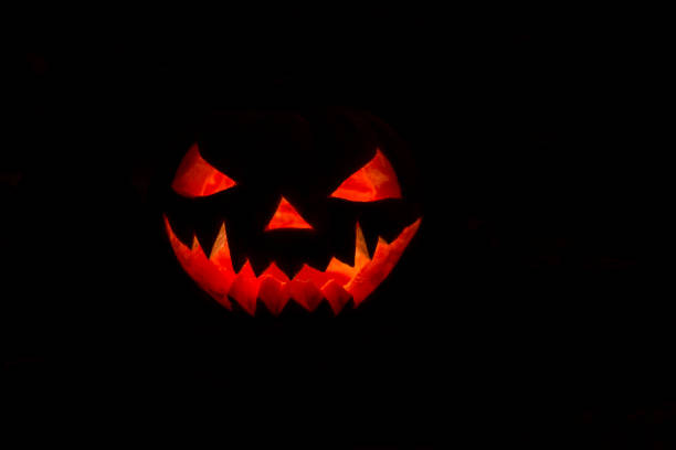light pumpkin jack on a black background