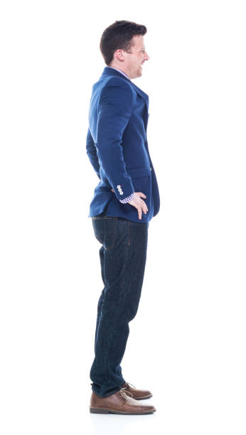 istock Handsome businessman with hands on hips 1047753986