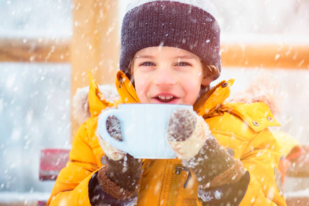 istock Boy Drinking Hot Tee Outdoor 1047756266