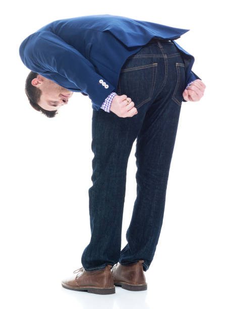 istock Rear view of businessman bowing 1047756278