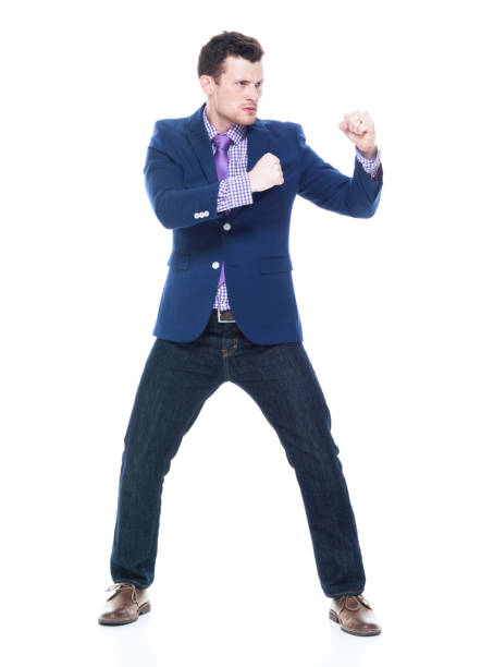 istock Side view of businessman fighting 1047756526