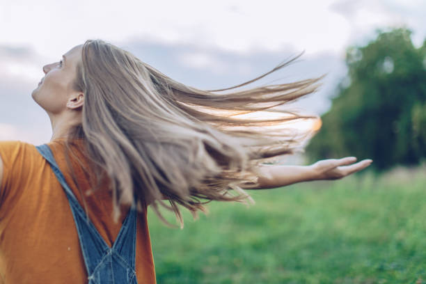 istock Beautiful girl loving nature 1047756656