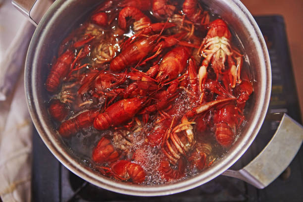 istock Crawfish cooking boiling in pot with spices 1047757190