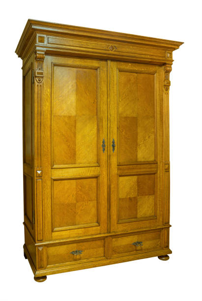 istock Antique vintage wood wardrobe isolated on white 1047757288