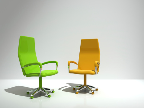 green and orange chairs in studio