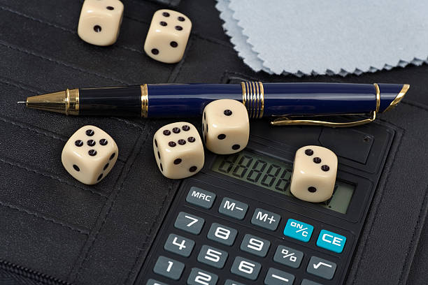 istock Calculator, pens, dice  and financial concept 104776449