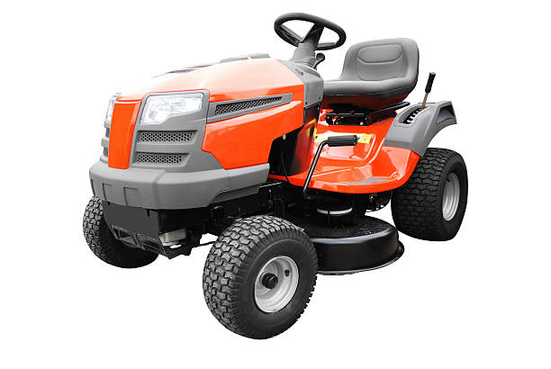 Riding lawn mower against white background stock photo