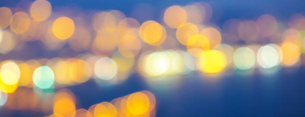 istock Abstract background selective focus bokeh lights of big city 1047778130