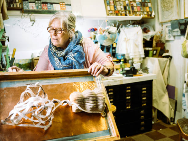 istock Senior woman artist at work 1047779170