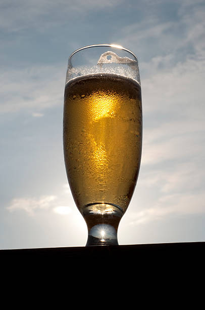 istock glass of beer on the railing 104778428