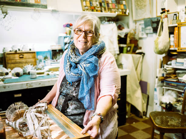 istock Senior woman artist at work 1047786072