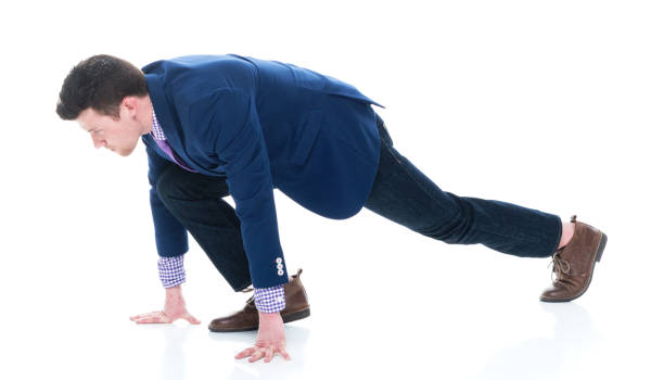 istock Side view of businessman in starting position 1047787612