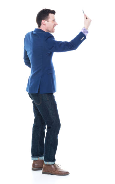 istock Handsome businessman taking a selfie 1047788004