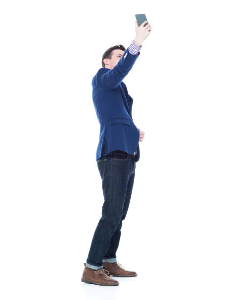 istock Handsome businessman taking a selfie 1047788014