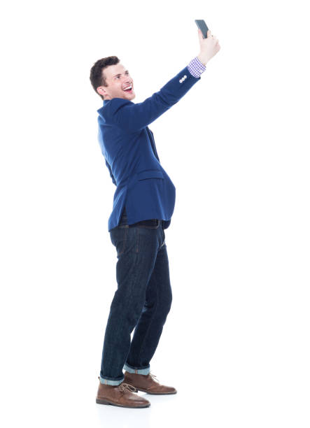 istock Handsome businessman taking a selfie 1047788030
