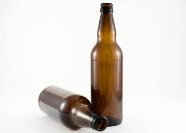 istock Bottles of beer isolated against a white background 1047788498