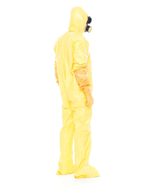 istock Man in protective clothing standing on white background 1047791270