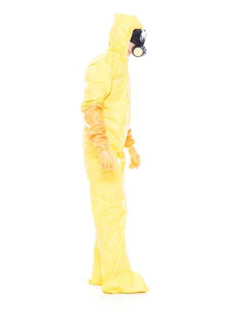 istock Man in protective clothing standing on white background 1047791272