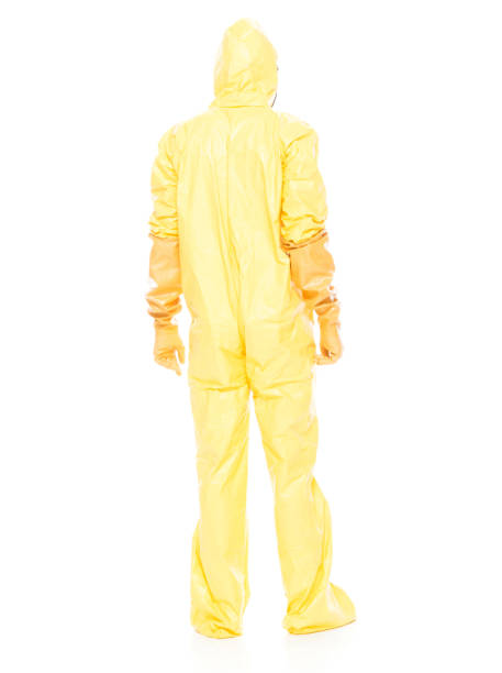 istock Man in protective clothing standing on white background 1047791274