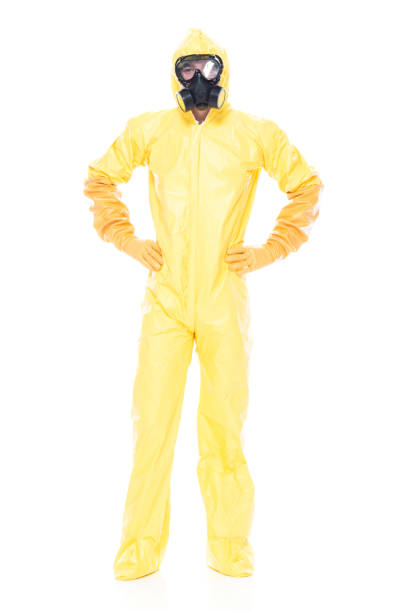 istock Man in protective clothing with hands on hips 1047791278