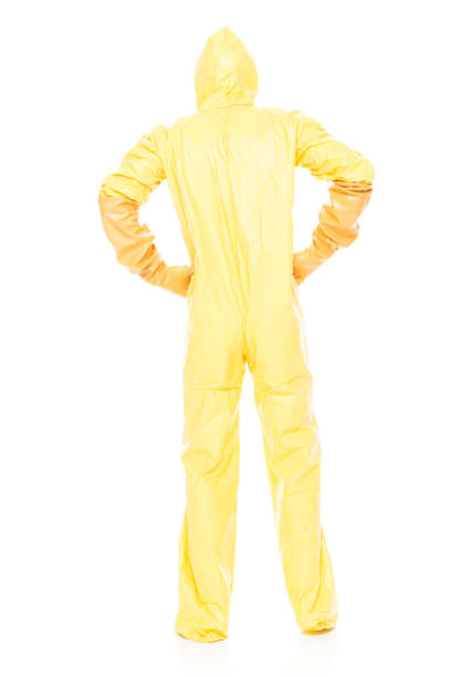 istock Man in protective clothing with hands on hips 1047791362