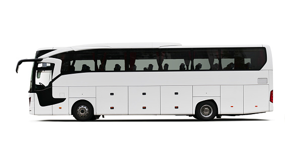 Side view of a white tour bus isolated on white background with a drop shadow.
