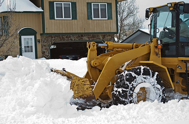 istock Clearing the Streets After May 2008 Blizzard 104779144