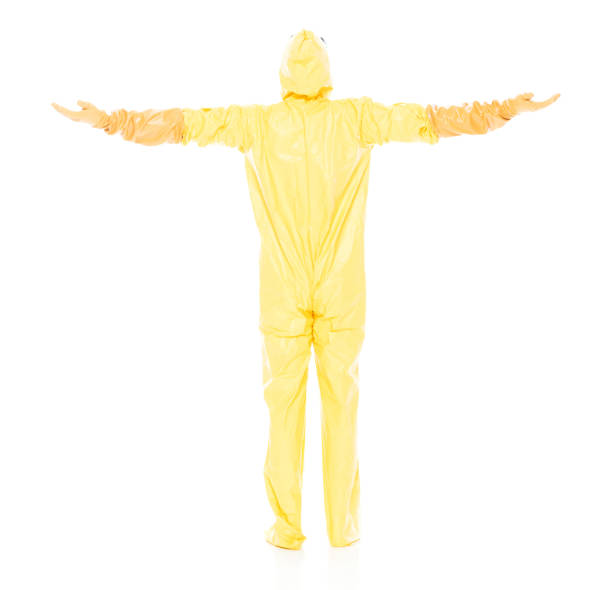 istock Man in protective clothing with arms outstretched 1047791550