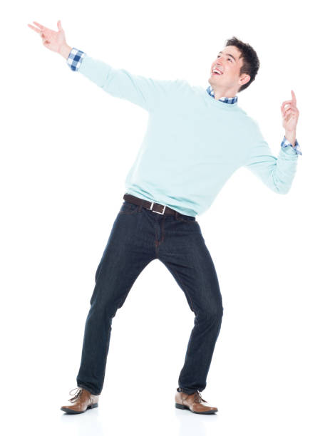 istock Handsome young man looking up in surprise 1047791802