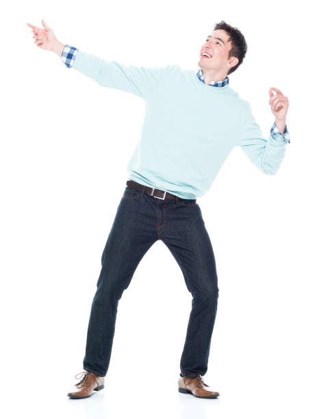 istock Handsome young man looking up in surprise 1047791814