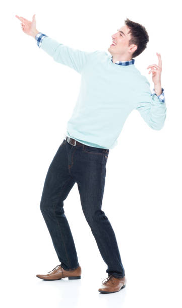 istock Handsome young man looking up in surprise 1047791842