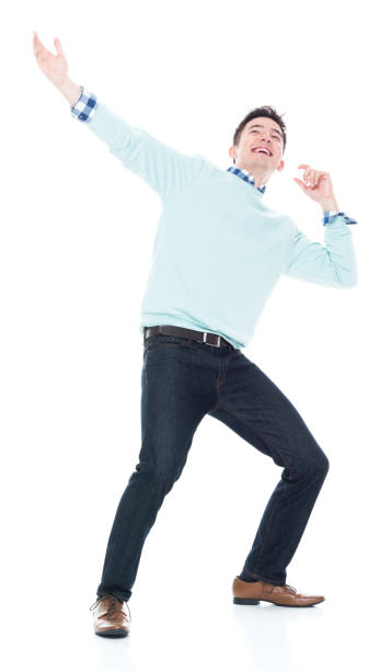 istock Handsome young man looking up in surprise 1047791916