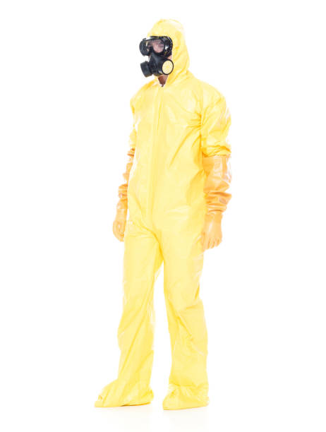 istock Man in protective clothing standing on white background 1047791930