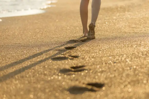 Photo of Woman walking on send