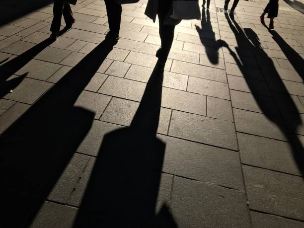 istock Shadows of people 1047801600