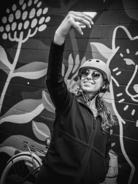 istock Young woman biking selfie 1047805000