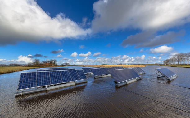 istock Group of Solar panels floating on water 1047805488
