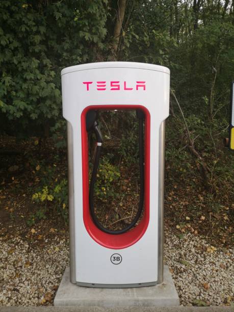 Tesla Charge point in West Midlands Service in M40 After Gaydon before Warwick exit Warwickshire, UK - October 1st, 2018 : Tesla Charge point in West Midlands Service in M40 After Gaydon before Warwick exit m40 sniper rifle stock pictures, royalty-free photos & images